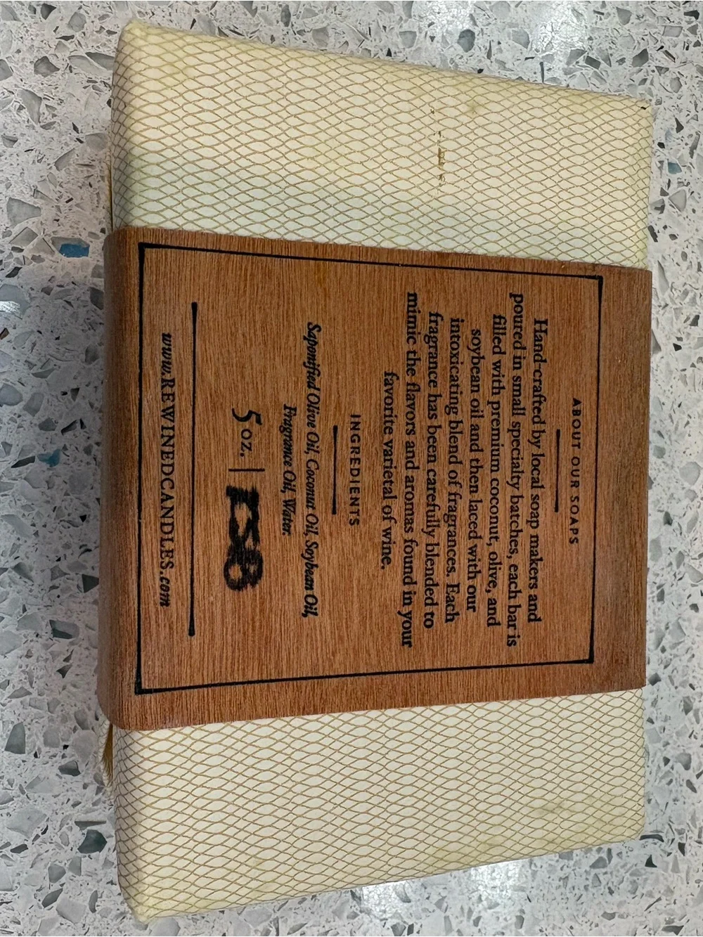 Collection of four assorted wrapped soaps